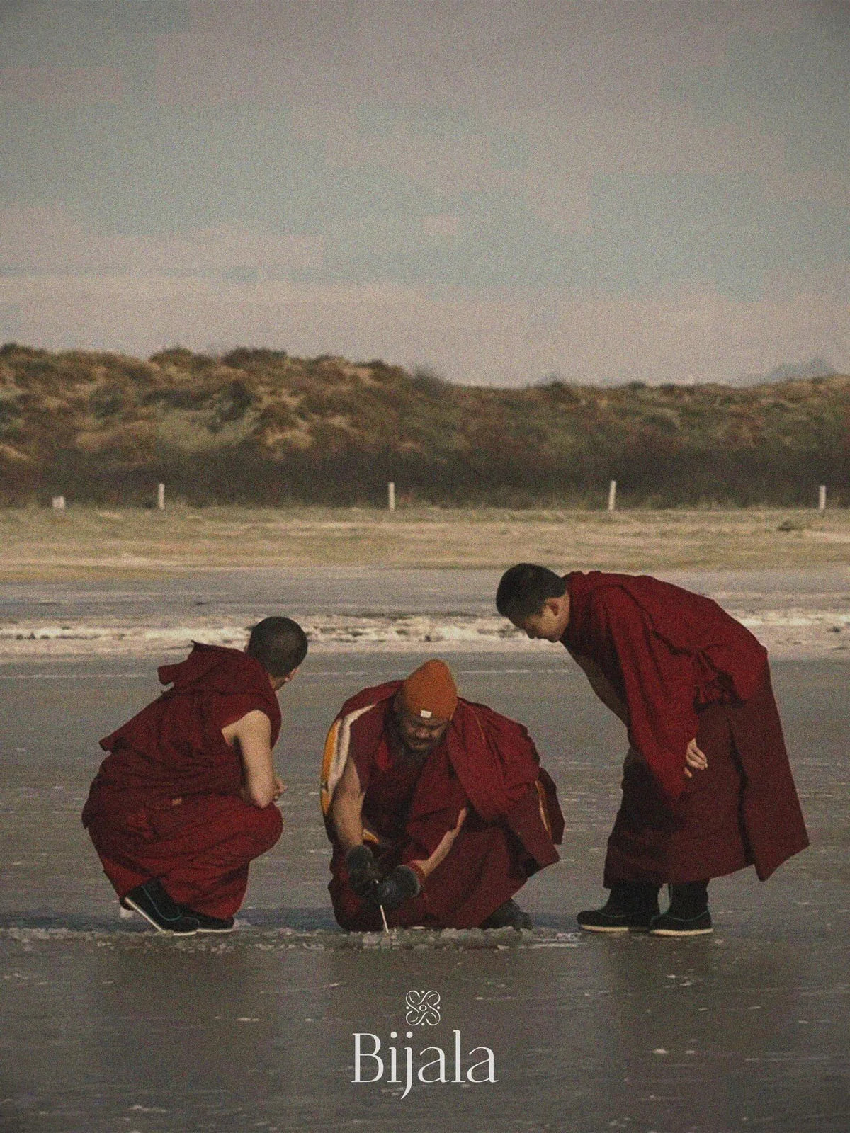 The monks at the water’s edge at the close of the ceremony