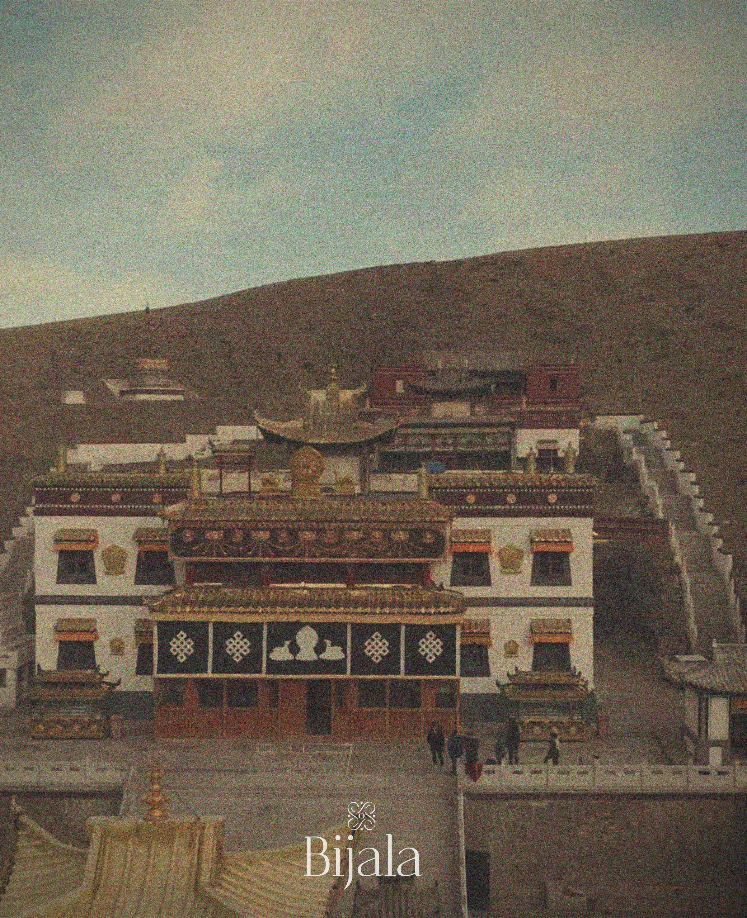 White Buddha Temple and the hillside beyond its courtyard