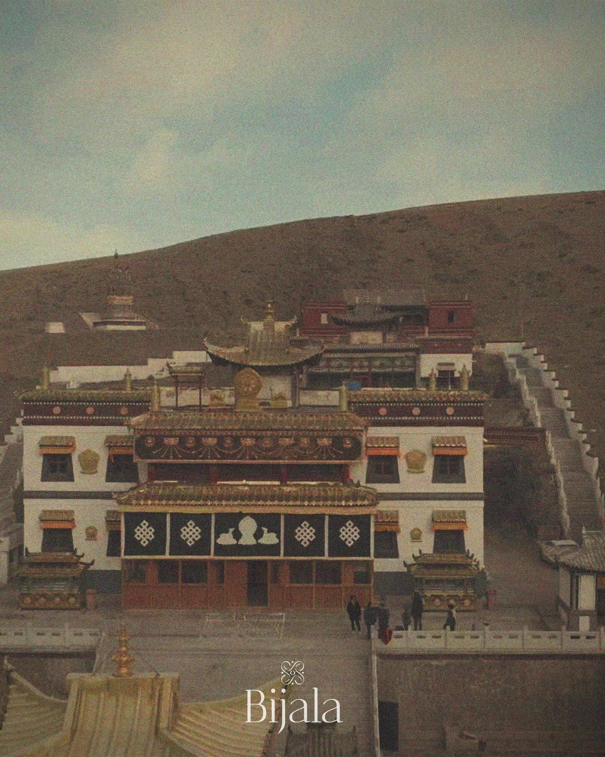 White Buddha Temple below the hillside